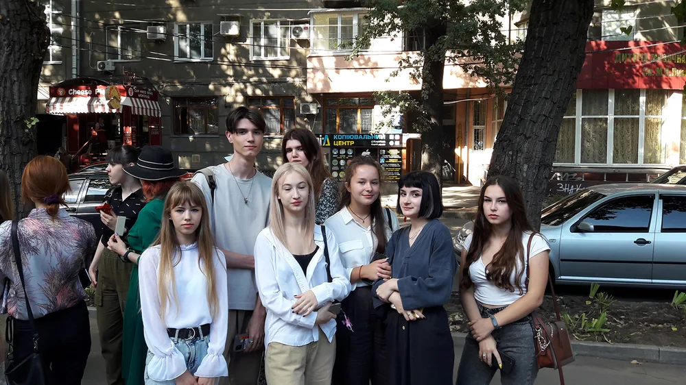 Students and a teacher outdoors