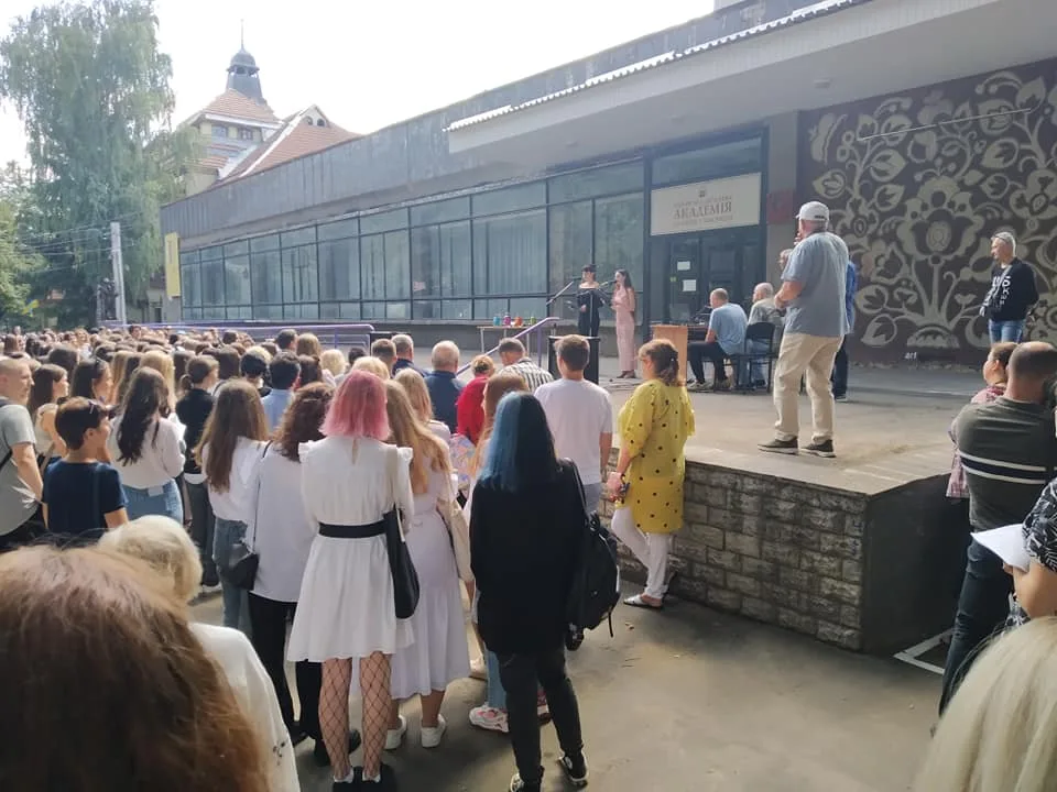 Students gathered outside a building